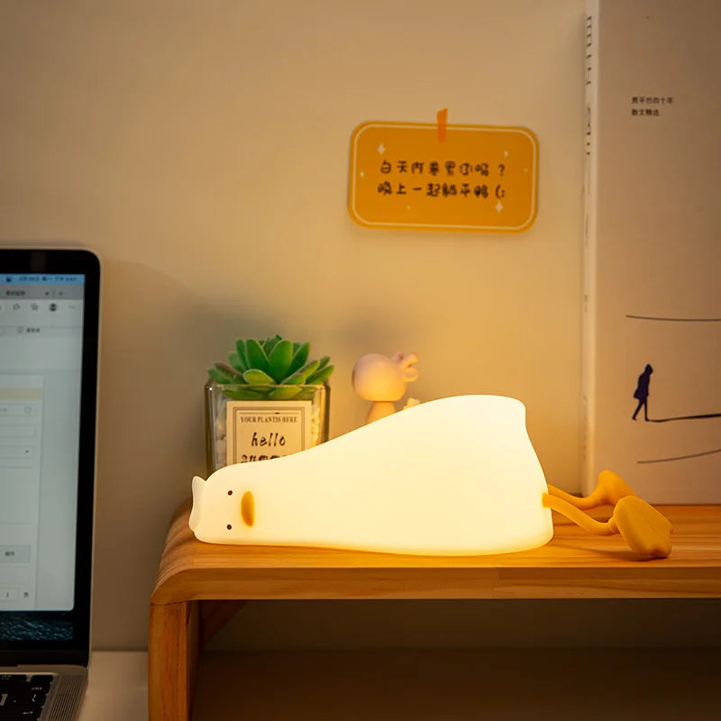Lying Flat Duck Night Light Silicone Squishy Rechargeable Tap Control 3 Brightness 30 Min Timer Phone Holder for Bedside