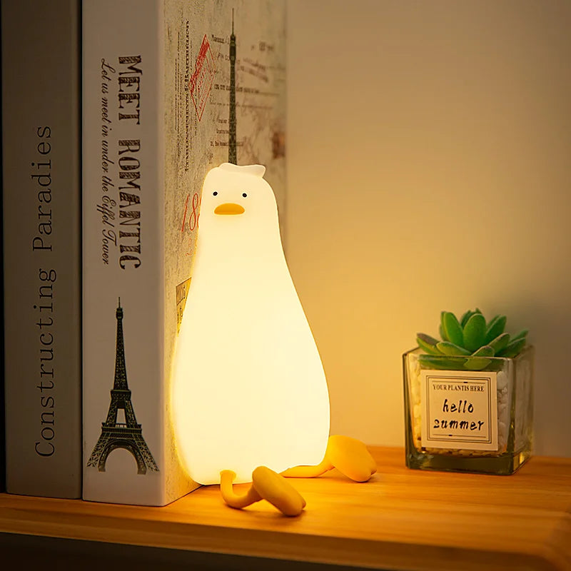 Lying Flat Duck Night Light Silicone Squishy Rechargeable Tap Control 3 Brightness 30 Min Timer Phone Holder for Bedside