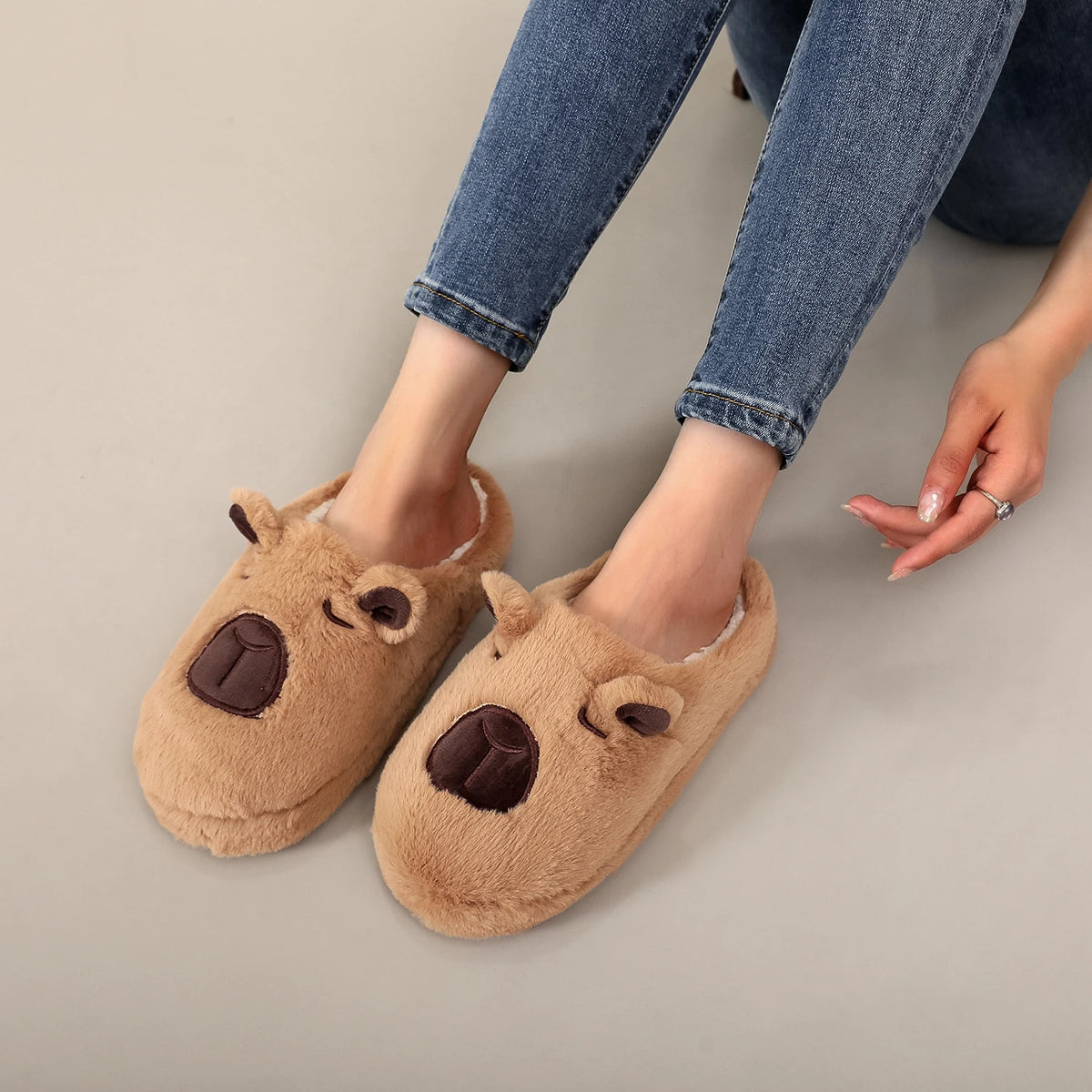 A Pair of Brown Plush Capybara Animal-Patterned Furry Home Slippers