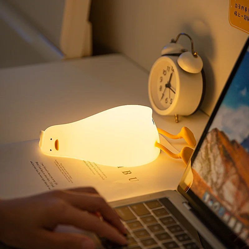 Lying Flat Duck Night Light Silicone Squishy Rechargeable Tap Control 3 Brightness 30 Min Timer Phone Holder for Bedside