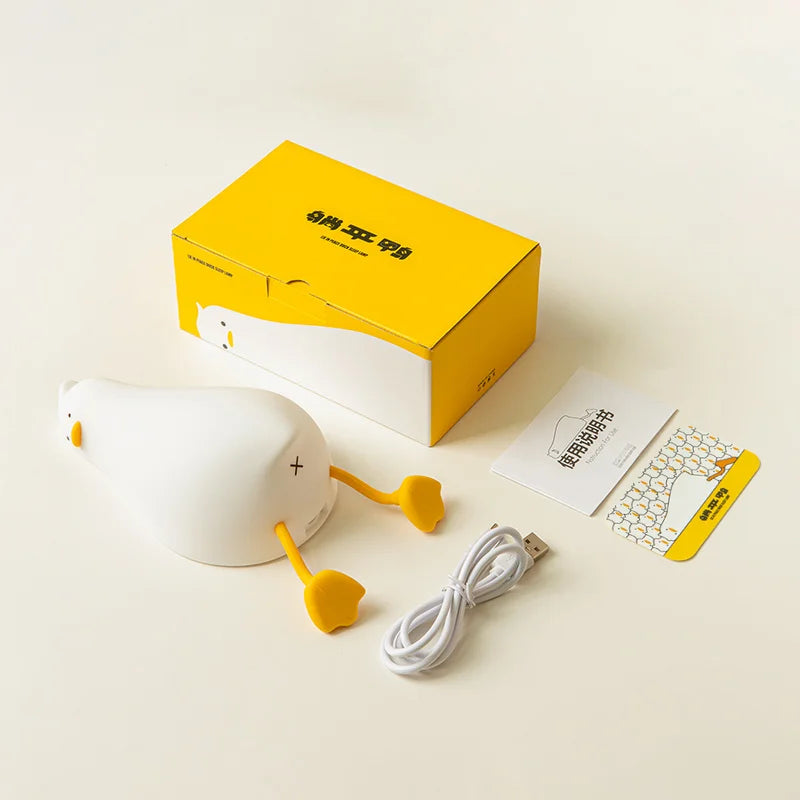Lying Flat Duck Night Light Silicone Squishy Rechargeable Tap Control 3 Brightness 30 Min Timer Phone Holder for Bedside